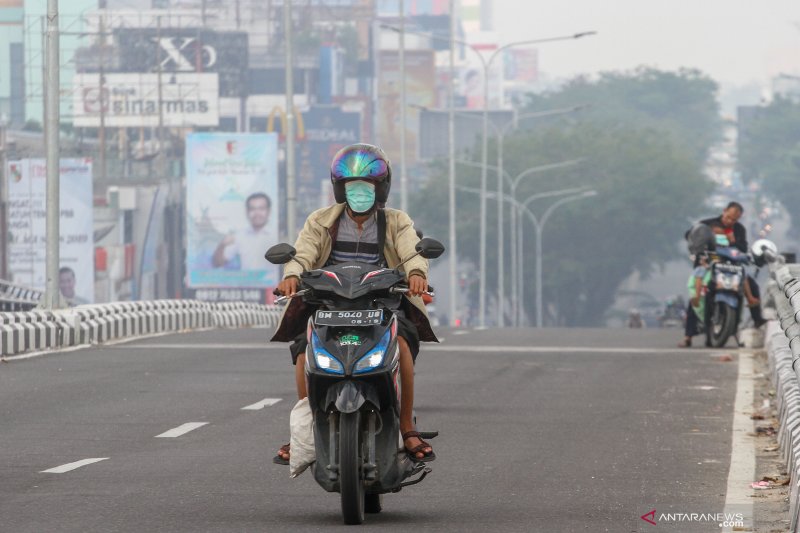 HUT ke-62 Provinsi 'Riau Hijau Bermartabat' Diselimuti Kabut Asap