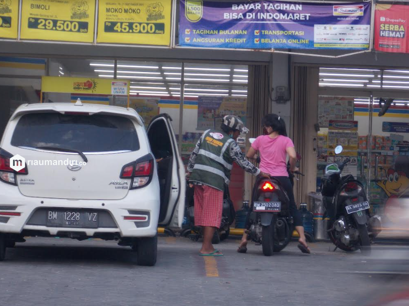 Sempat Dihentikan, Tukang Parkir Indomaret dan Alfamart Bakal Muncul Lagi