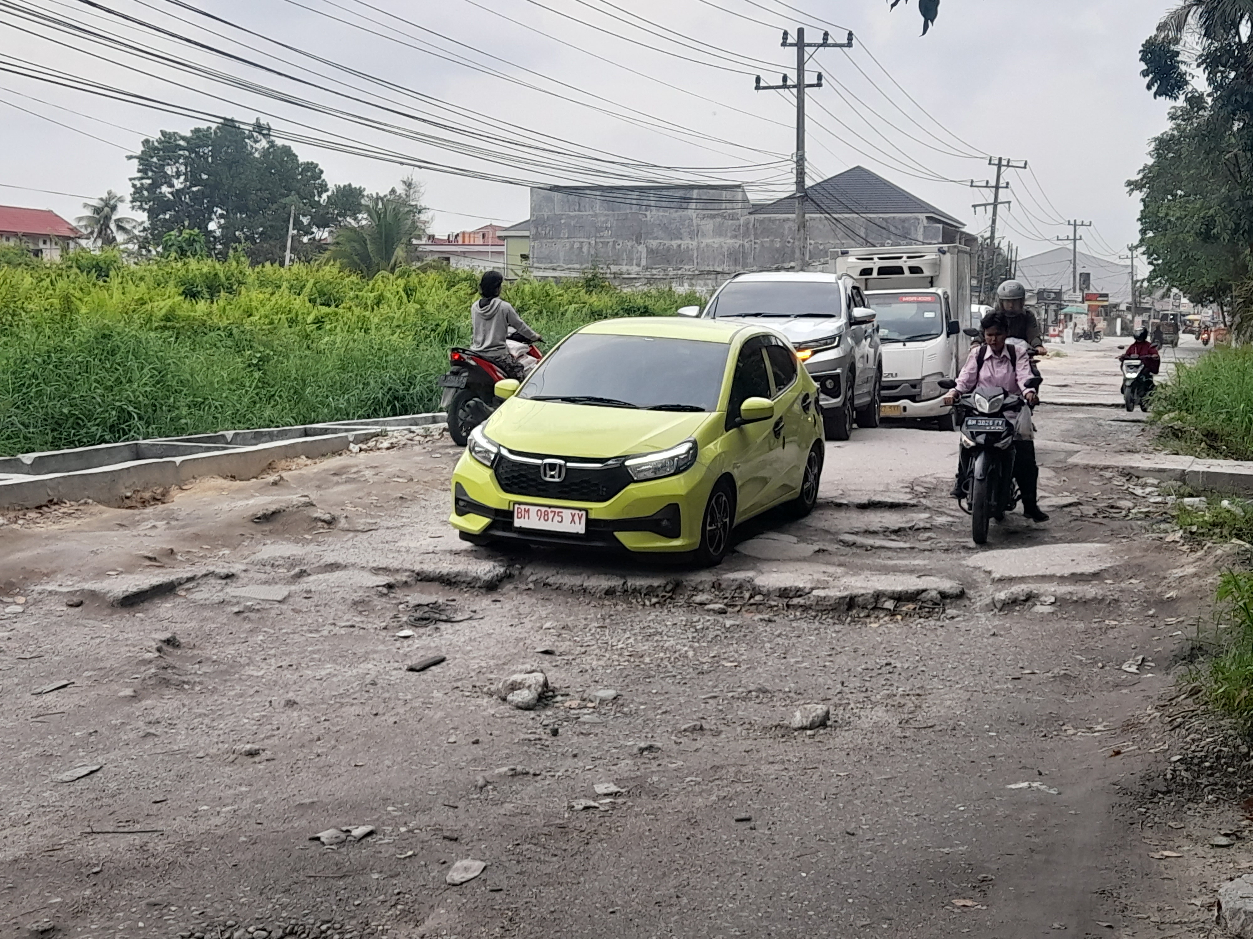 Pernyataan Sekda Indra Pomi dan Kadis PUPR Edward Berseberangan Soal Parbaikan Jalan Bangau Sakti