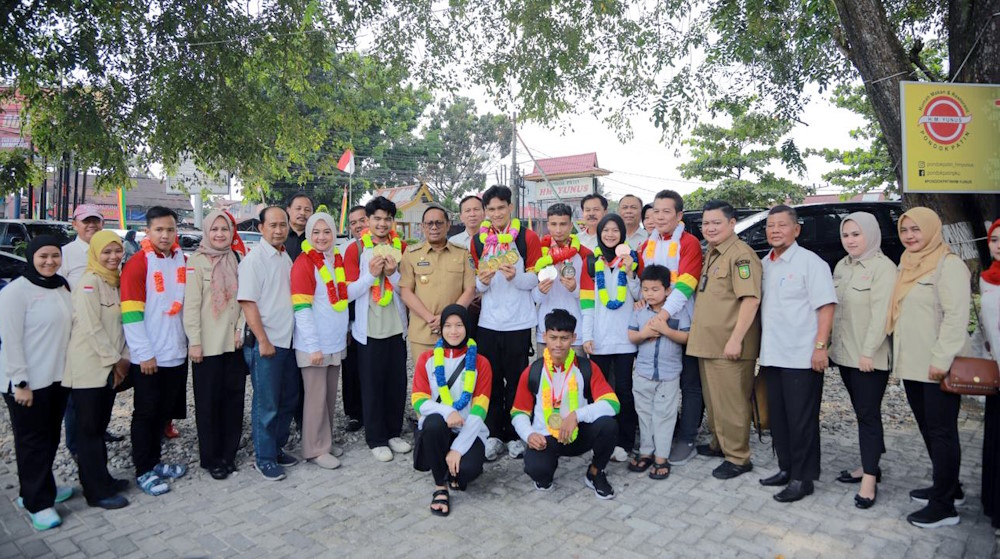 Pj Gubri Sambut Kepulangan Atlet Senam Riau dari PON XXI